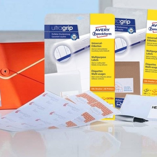 Baner prezentujący paczki etykiet uniwersalnych z technologią ultra grip