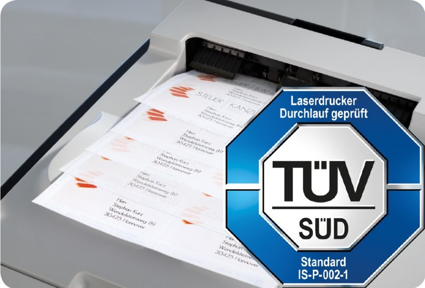 Logo TUV z naklejkami Avery w tle