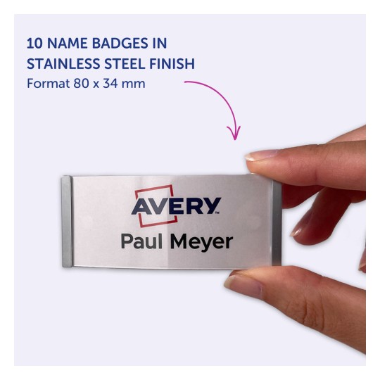 Obraz przedstawia 10 identyfikatorów z wykończeniem ze stali nierdzewnej, na których widnieje logo 'Avery' i imię 'Paul Meyer'. Identyfikatory są ukazane w dłoni osoby.