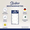 Obraz przedstawia pakiet naklejek designerskich, podkreślając ich cechy: łatwe do oznaczania, łatwe do odklejania, wyprodukowane w Niemczech i wykonane z ekologicznego papieru. Wspomniano również o efekcie złota.