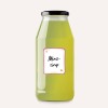 Butelka syropu miętowego z etykietą o treści 'Minz-sirup'. Syrop ma zielonkawy odcień.